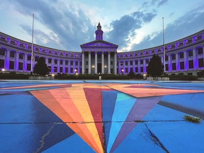 Colorful mural painted right in front of a federal building in Denver, Colorado.